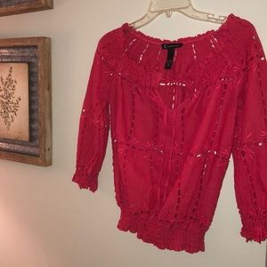 Bright pink elastic waist top.